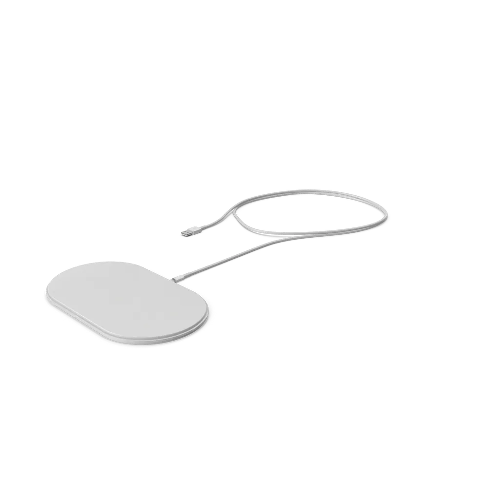 Apple AirPower wireless charging mat with iPhone and AirPods placed on white surface