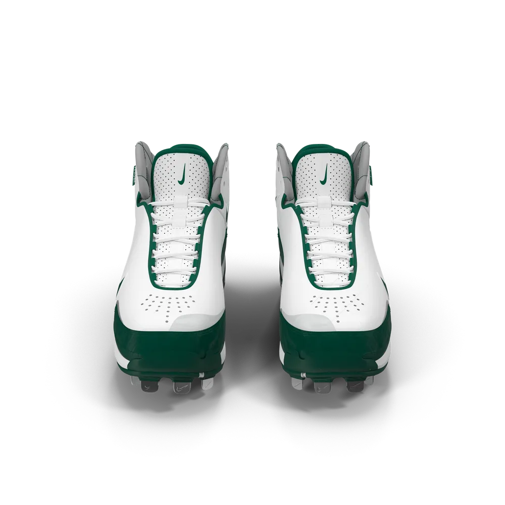 Nike Baseball Cleats with aggressive cleat pattern on a red clay baseball diamond