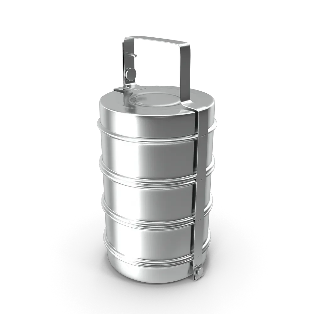 Portable lunch box with divided compartments open and filled with fresh food on a light background