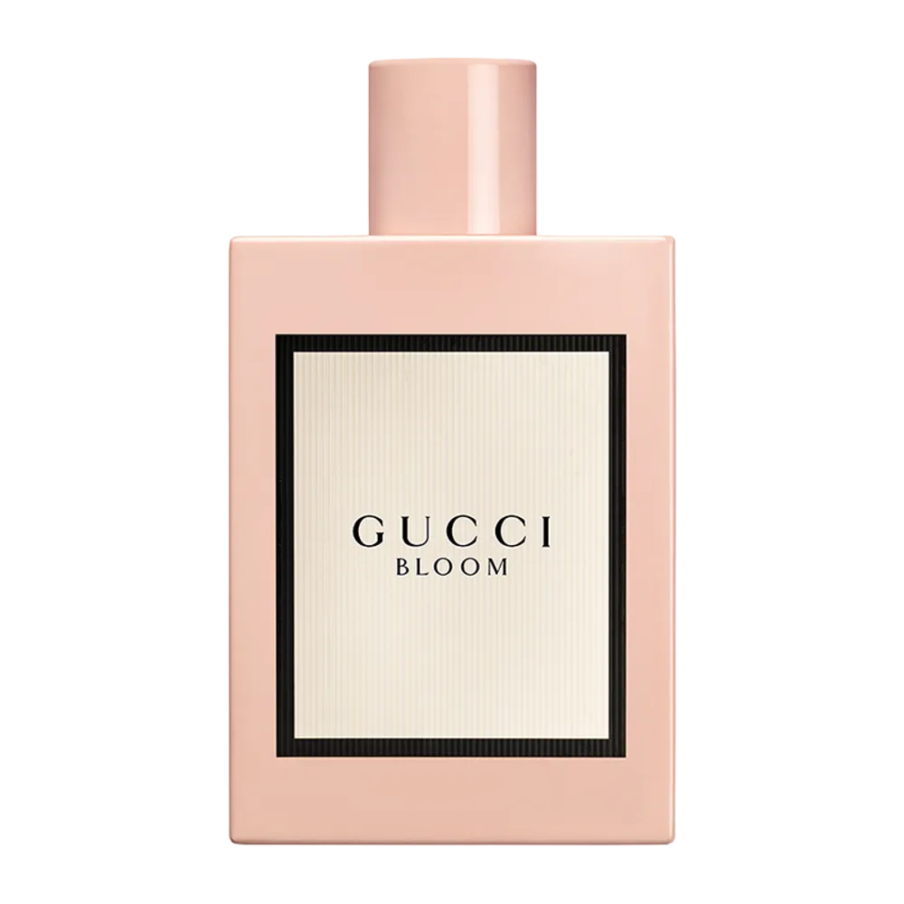 Gucci Bloom Eau de Parfum bottle with floral white packaging on a clean white background
