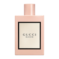 Gucci Bloom Eau de Parfum bottle with floral white packaging on a clean white background