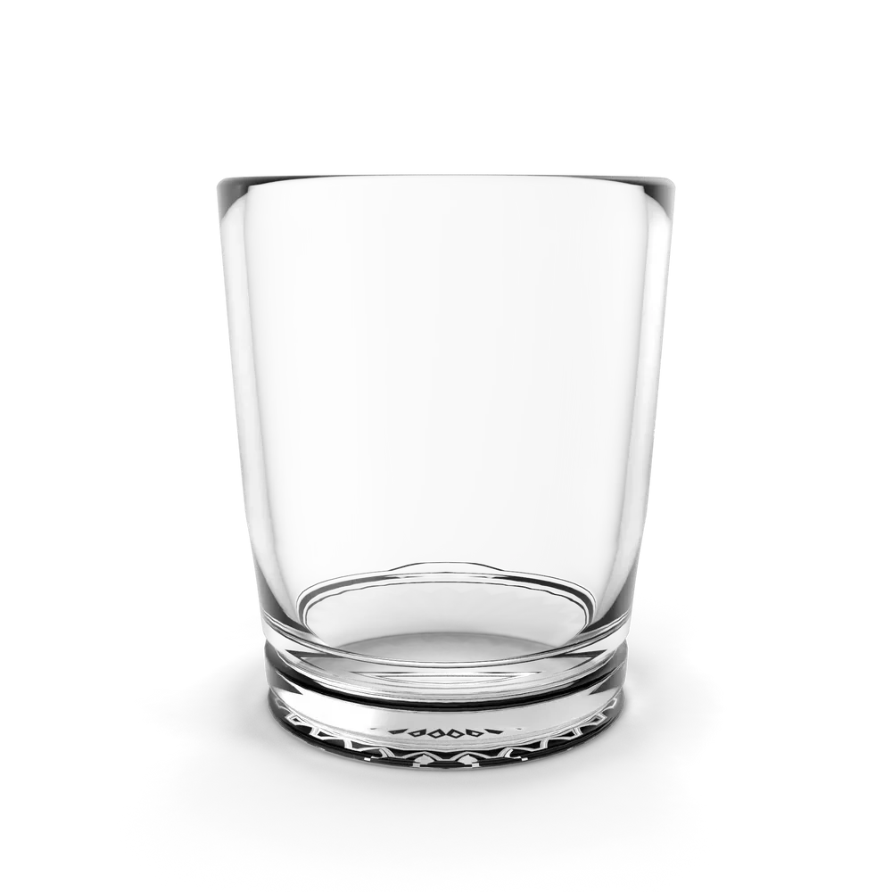Clear elegant drinking glass filled with a colorful beverage on a clean white surface