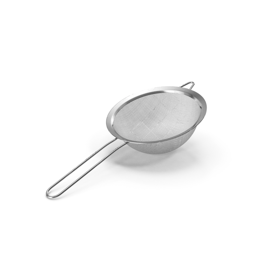 Stainless steel fine mesh strainer with long handle resting over a bowl on a kitchen counter