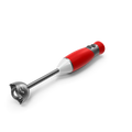 Compact hand blender with stainless steel blending shaft held over a pot of blended soup in a modern kitchen