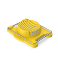 Stainless steel wire egg slicer with a boiled egg being sliced into even rounds on a white surface