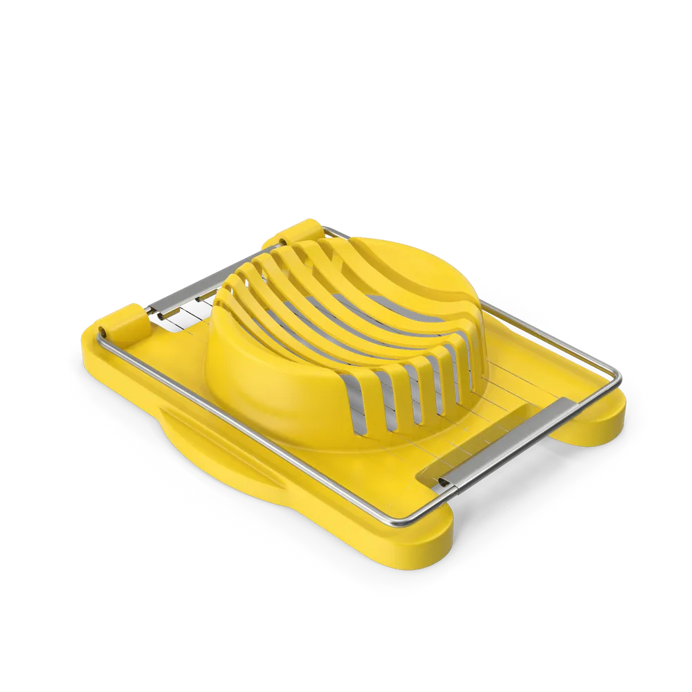 Stainless steel wire egg slicer with a boiled egg being sliced into even rounds on a white surface