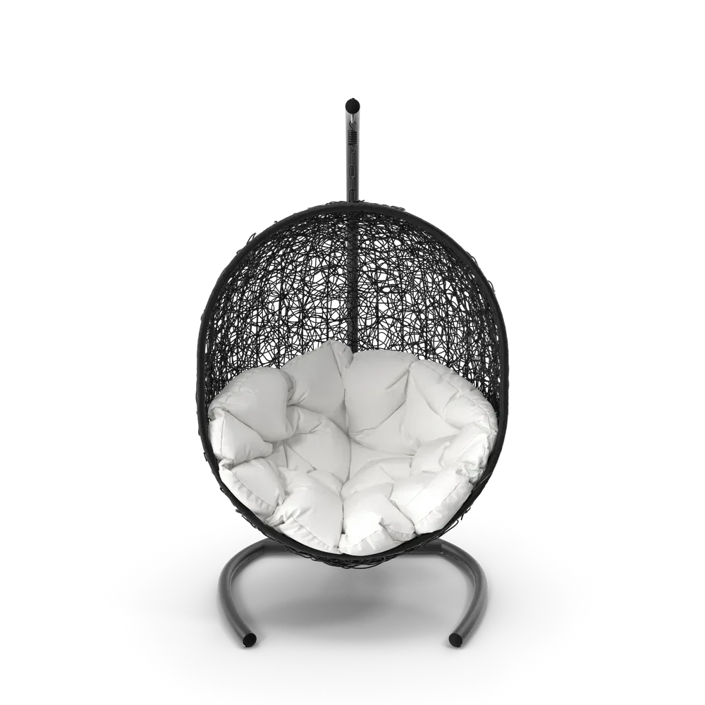 Decorative miniature swing ornament with intricate details displayed on a wooden shelf in a cozy home interior