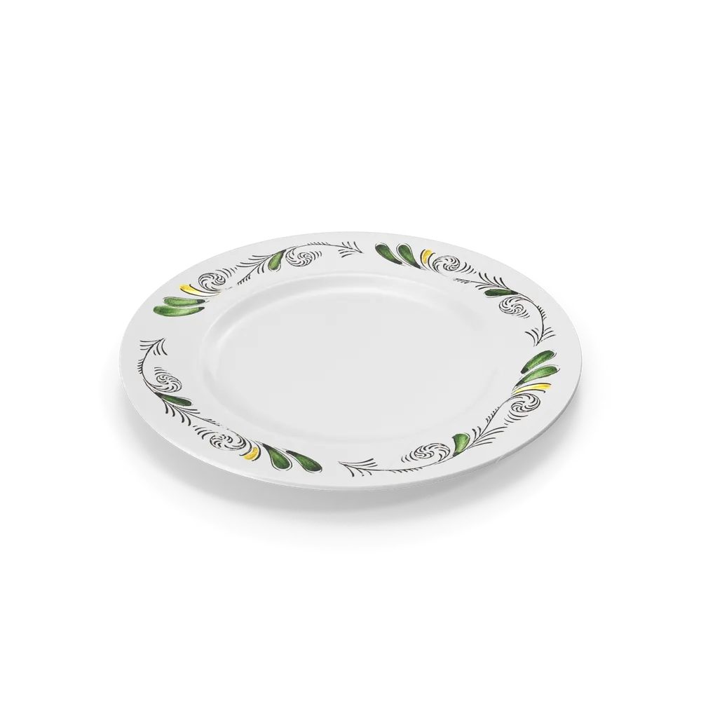 Classic round white ceramic dinner plate on a clean wooden table surface