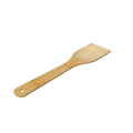 Eco-friendly bamboo spatula with smooth natural finish resting on a wooden kitchen countertop