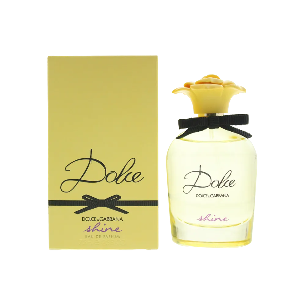Dolce & Gabbana Dolce Shine fragrance bottle surrounded by fresh mango slices and jasmine flowers