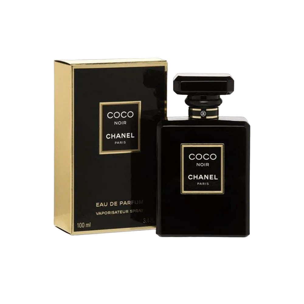 Chanel Coco Noir perfume displayed on a dark reflective surface with soft evening lighting