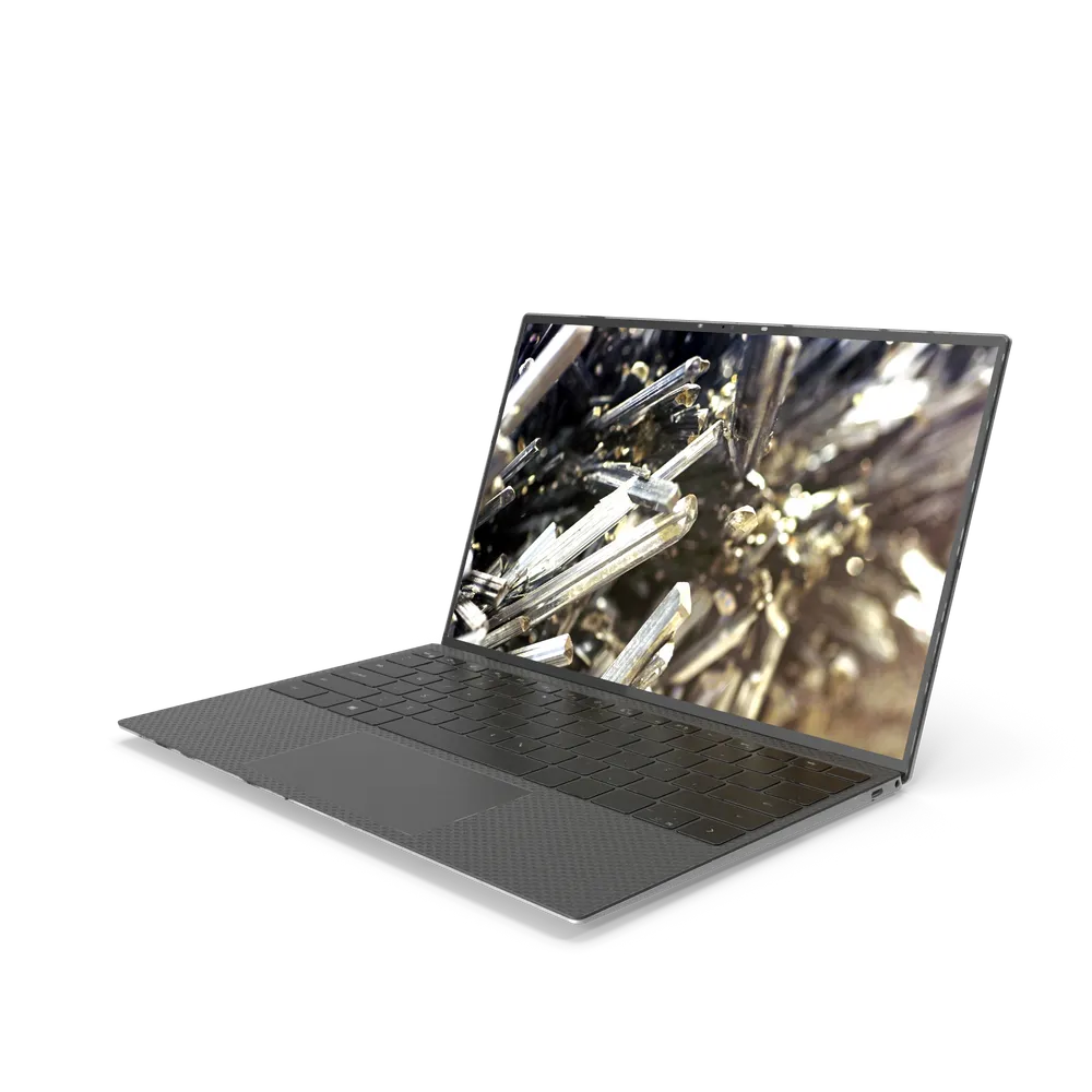 Dell XPS 13 9300 laptop keyboard and trackpad close-up with backlit keys