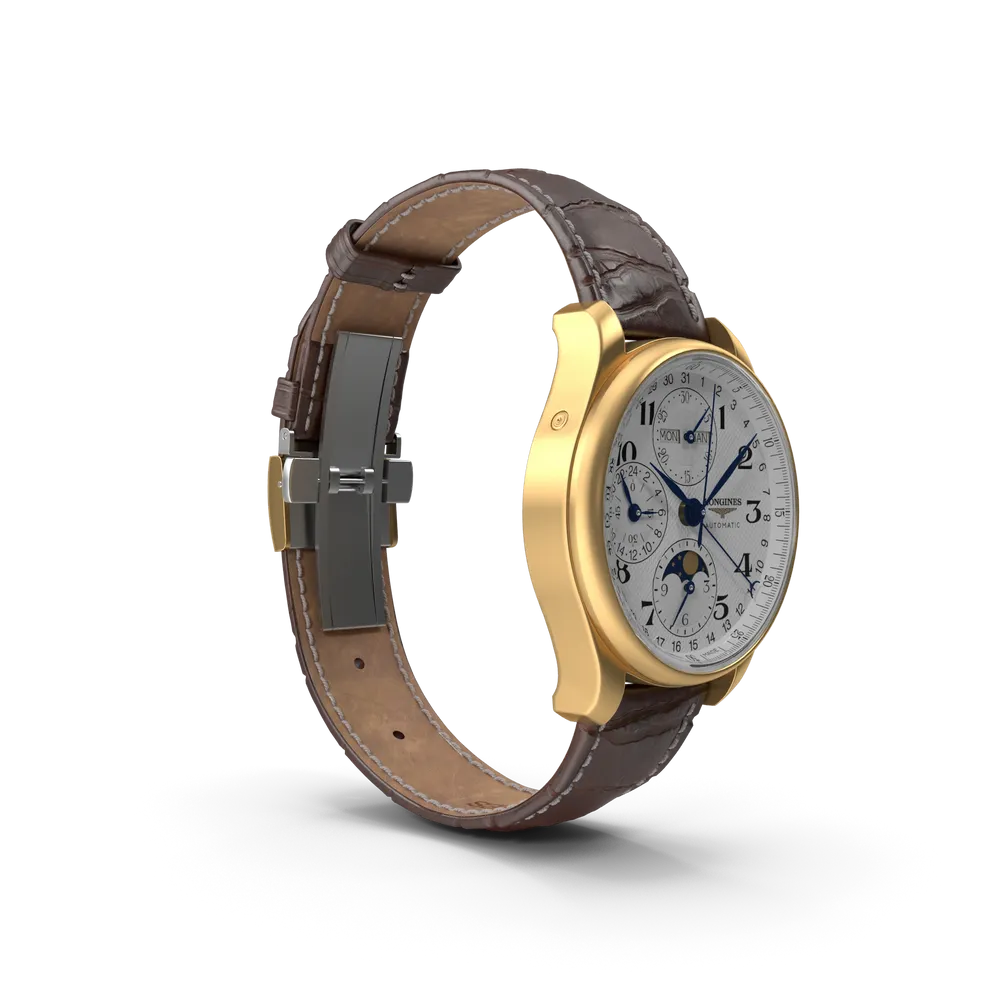 Brown leather wristwatch worn on a man's wrist with a formal dress shirt